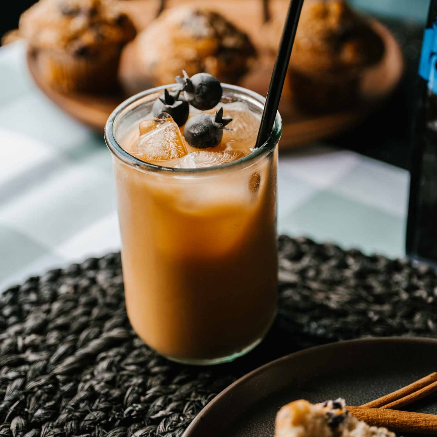 Blueberry Death Wish Coffee, iced with blueberries on top.
