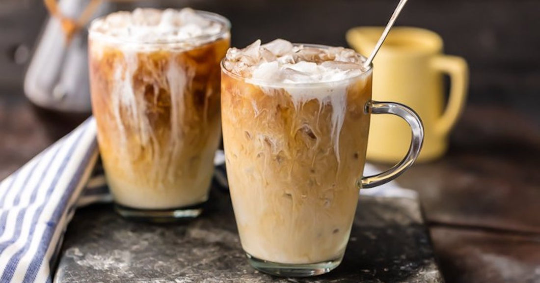 Iced coffee in a clear coffee mug.