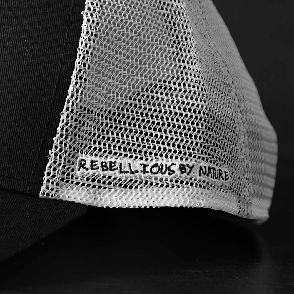 The embroidery on the left side of the Death Wish Coffee Rebellious By Nature Trucker Hat.