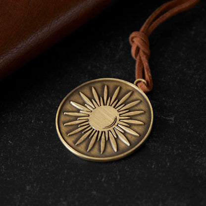 The sun medallion of the Death Wish Coffee Tree of Life Journal.