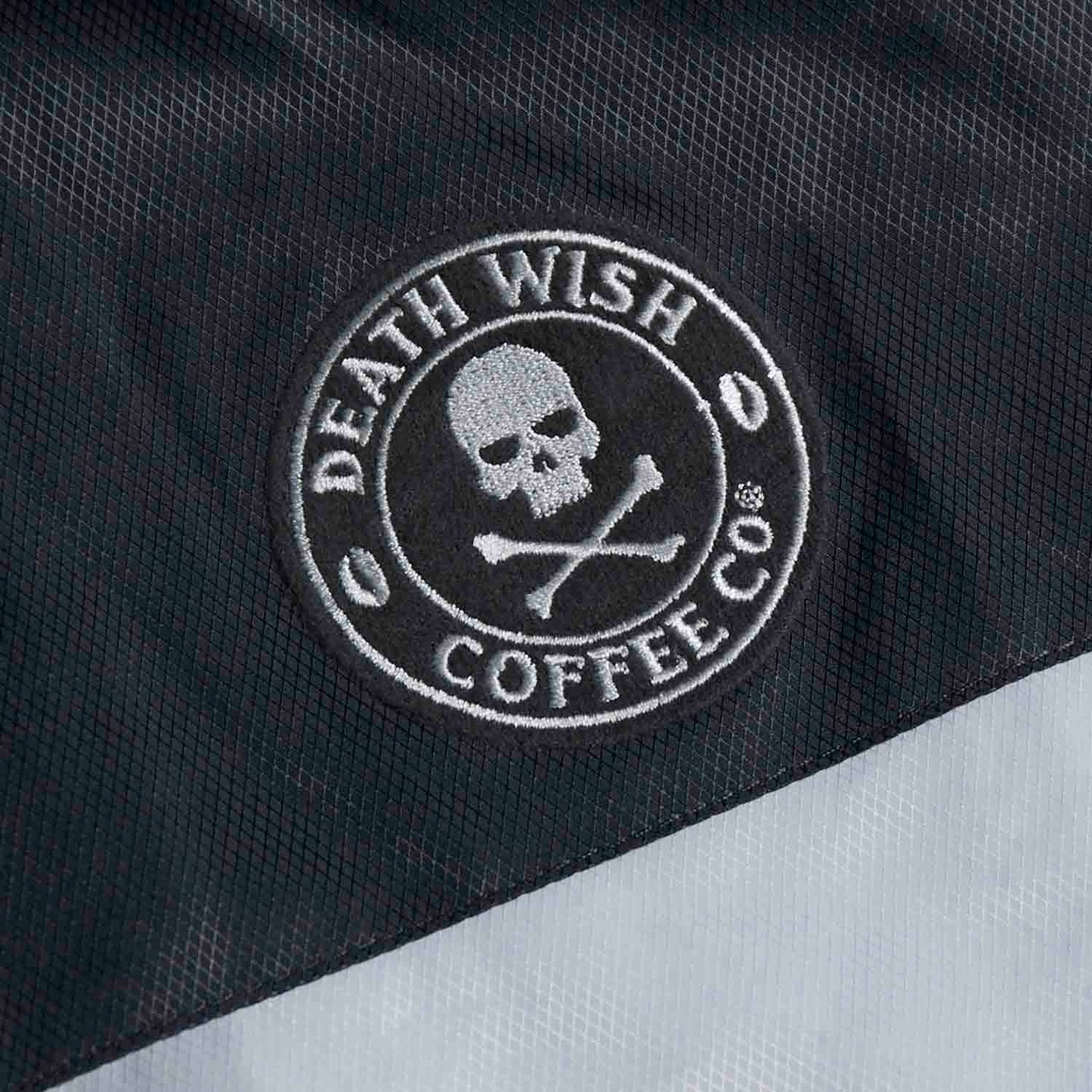 The front logo of the Death Wish Coffee Photo Finish Windbreaker.