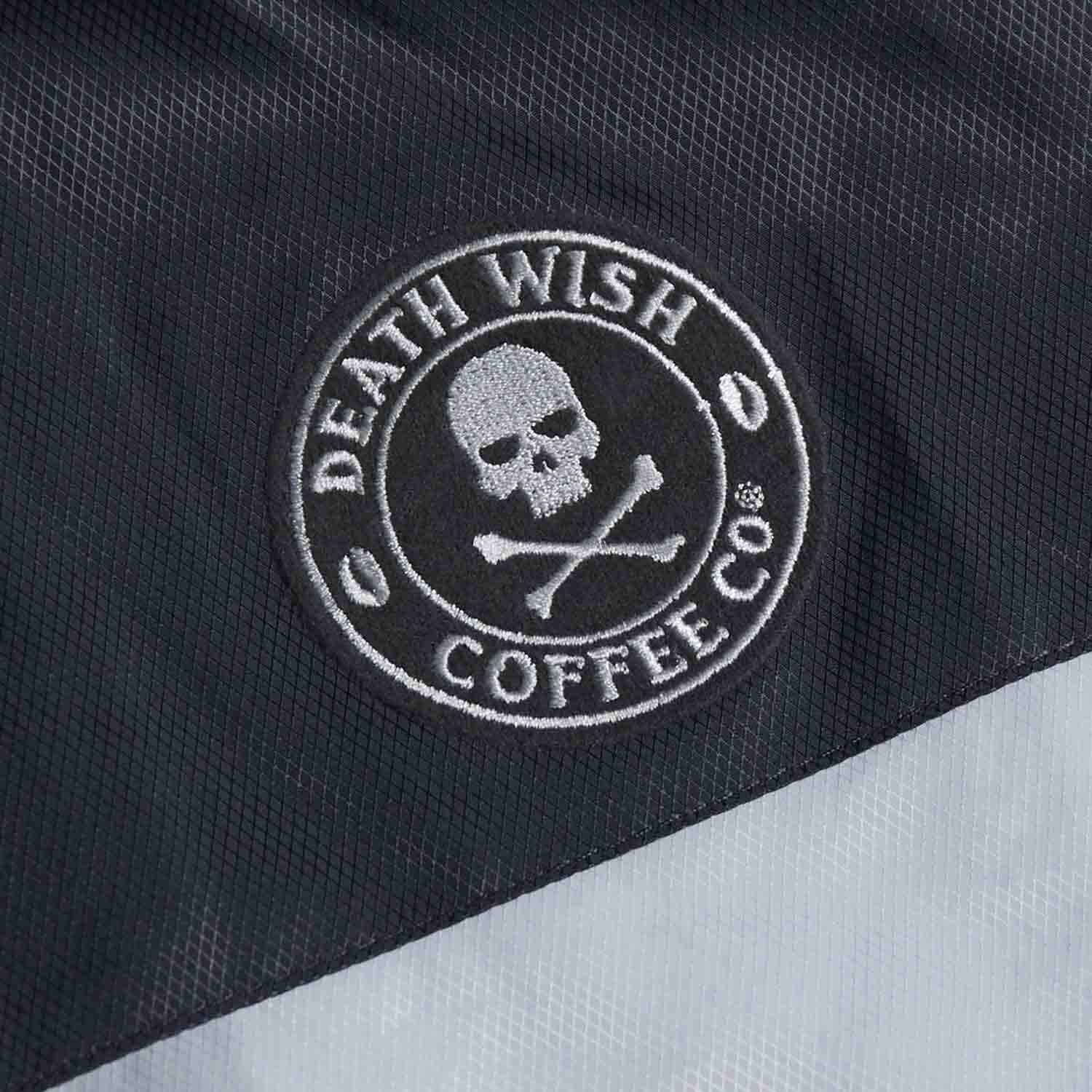 The front logo of the Death Wish Coffee Photo Finish Windbreaker.