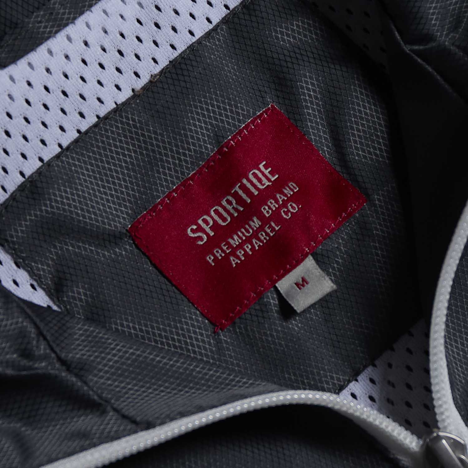 The inner neck label of the Death Wish Coffee Photo Finish Windbreaker.
