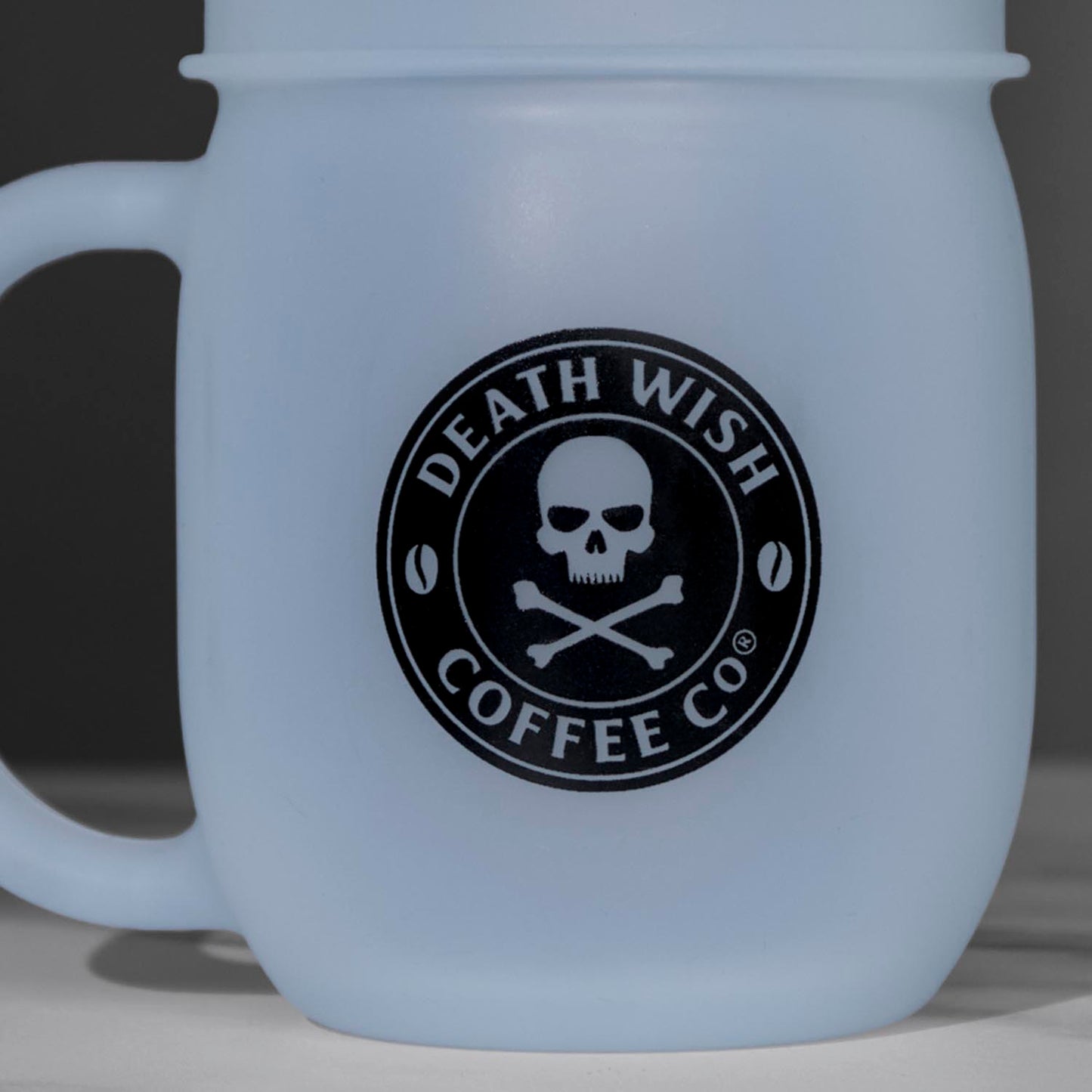 A detail shot of the front of the Death Wish Coffee Unbreakable Spirit Silicone Mug.