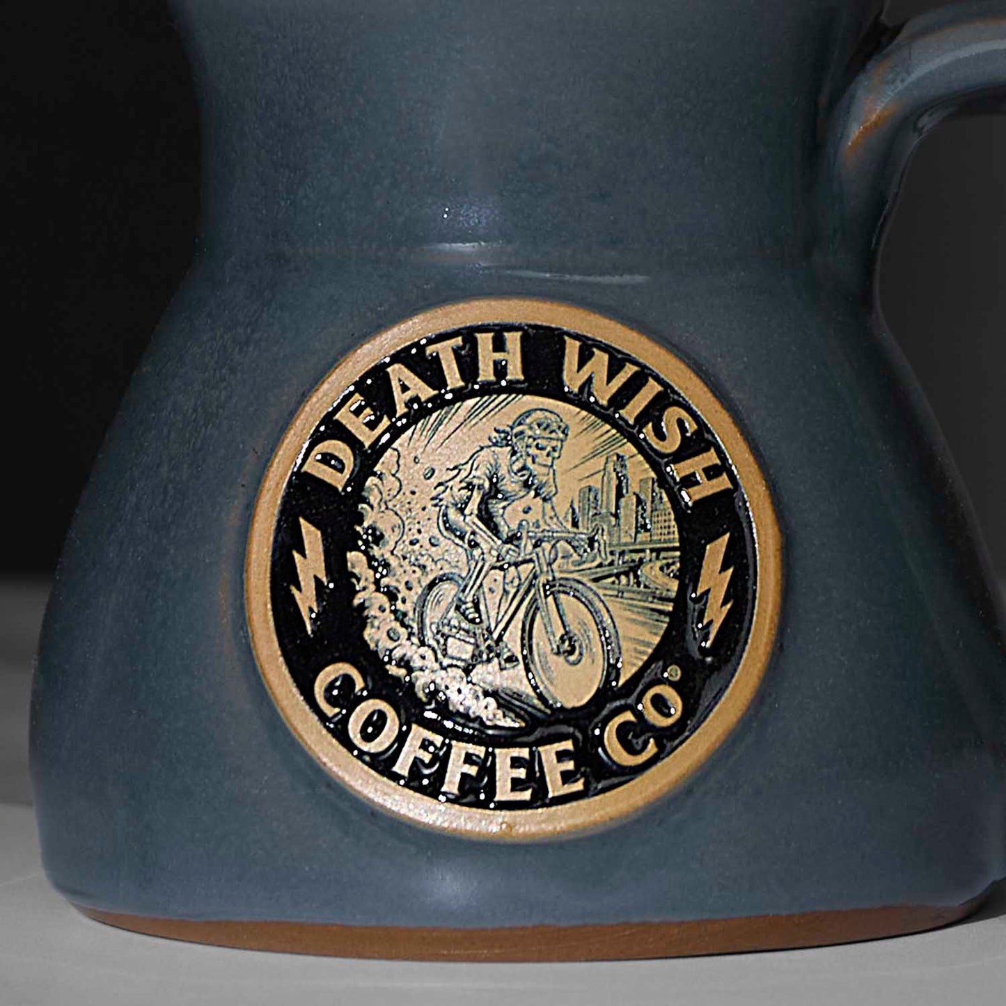 A detailed close up of the Death Wish Coffee Ride or Die Mug.
