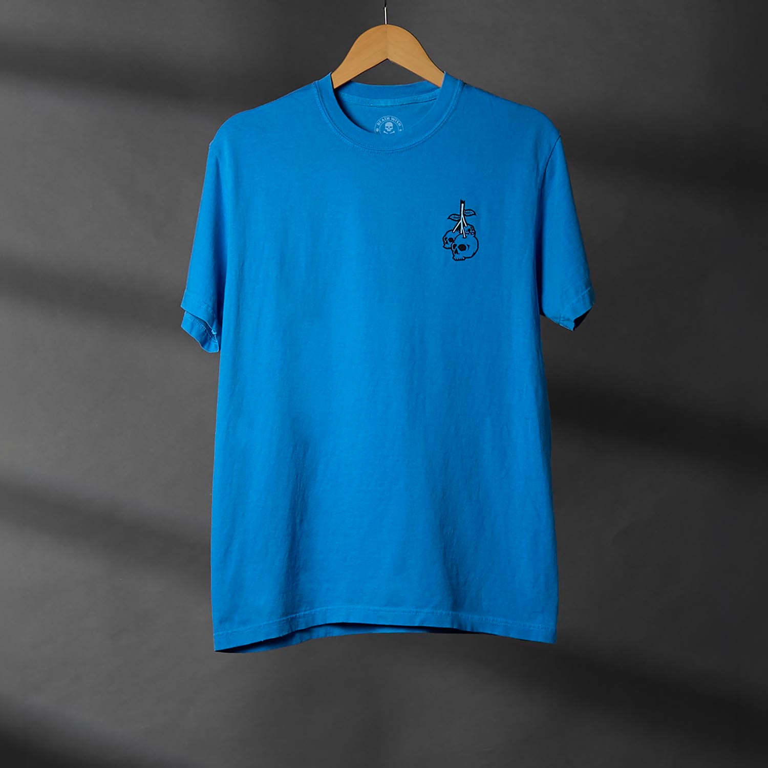 The front of the Death Wish Coffee Bury Your Blues Tee.