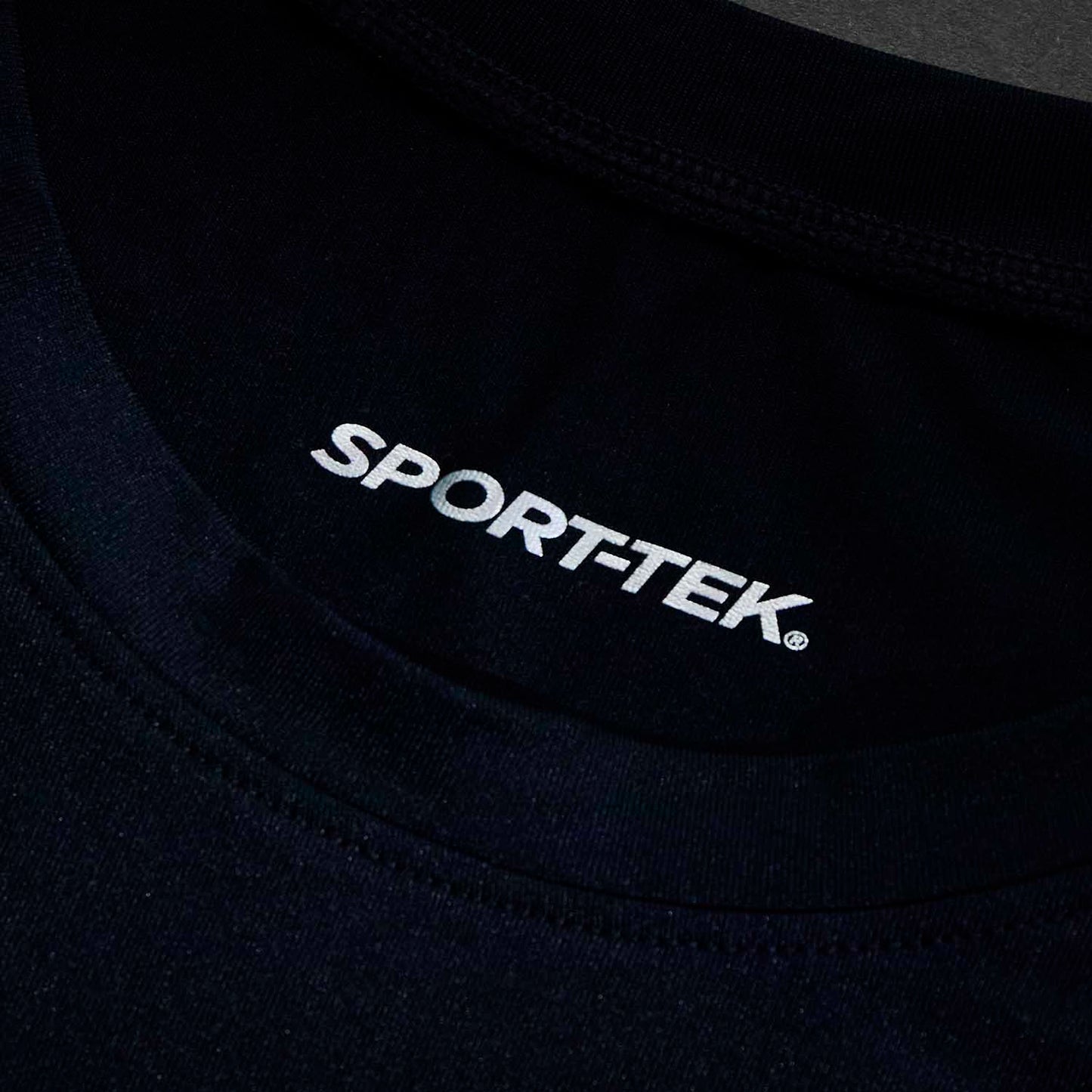 The inner neck label of the Death Wish Coffee Bone Dry Cycling Jersey.