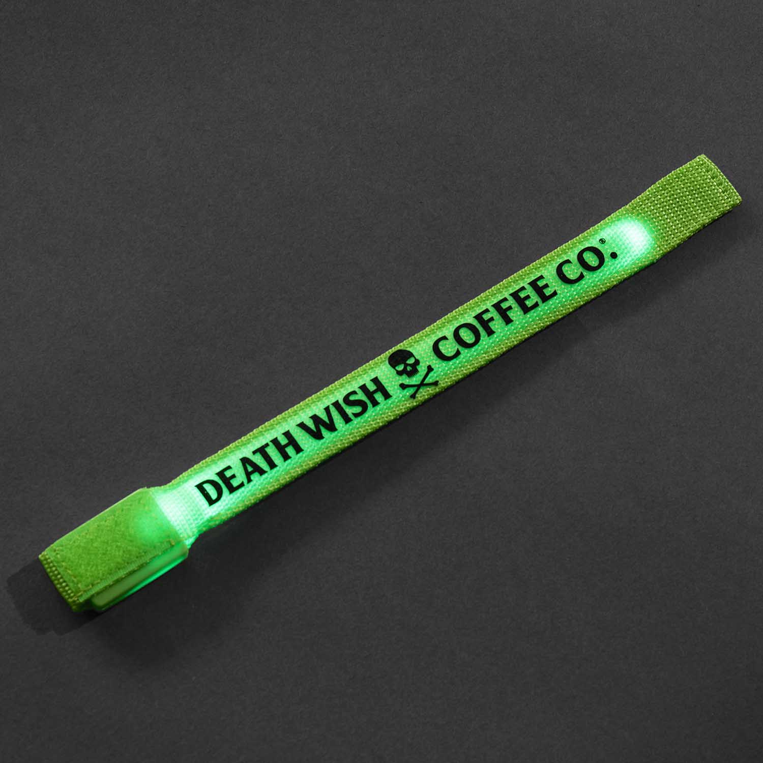 The Death Wish Coffee Midnight Marker Arm Band with the lights turned on.