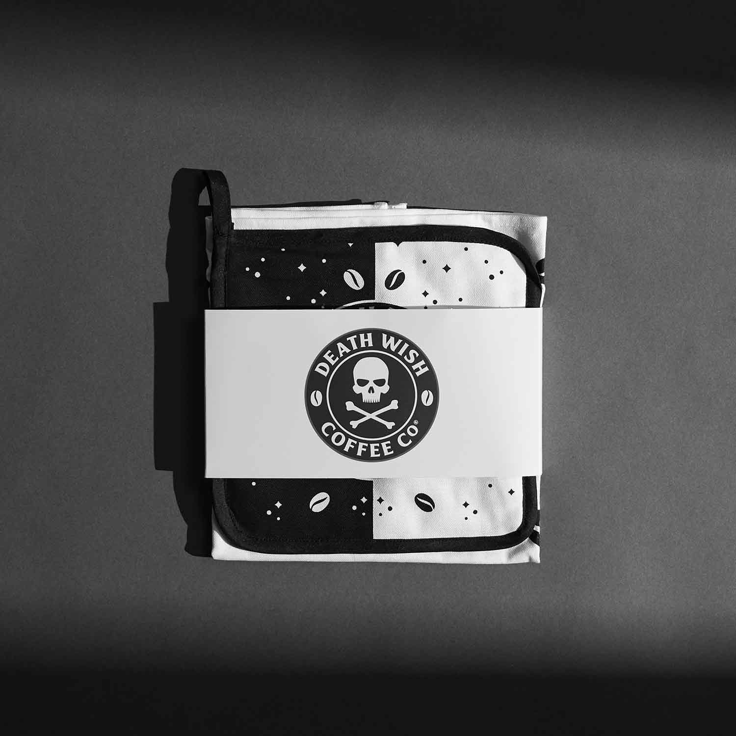 Packaging of the Death Wish Coffee Witch's Kitchen Towel and Potholder Set.