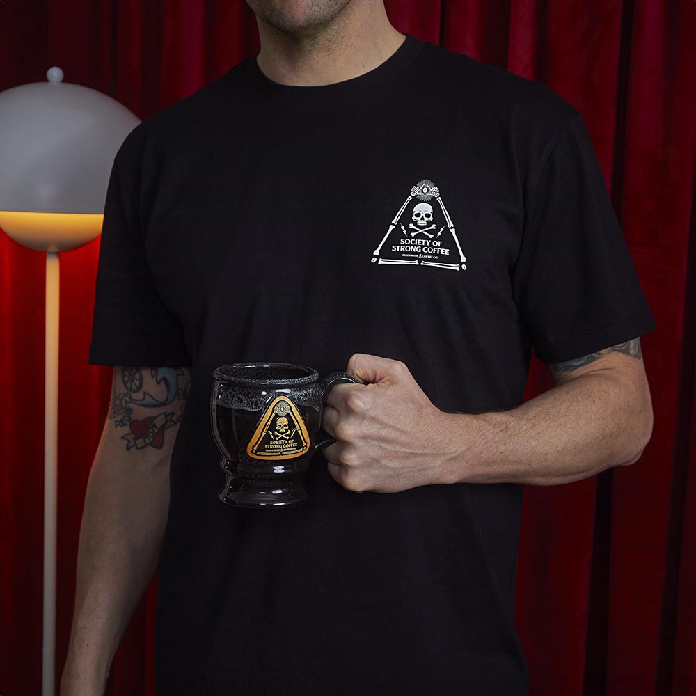 A model wearing the Death Wish Coffee Society Insignia Tee.